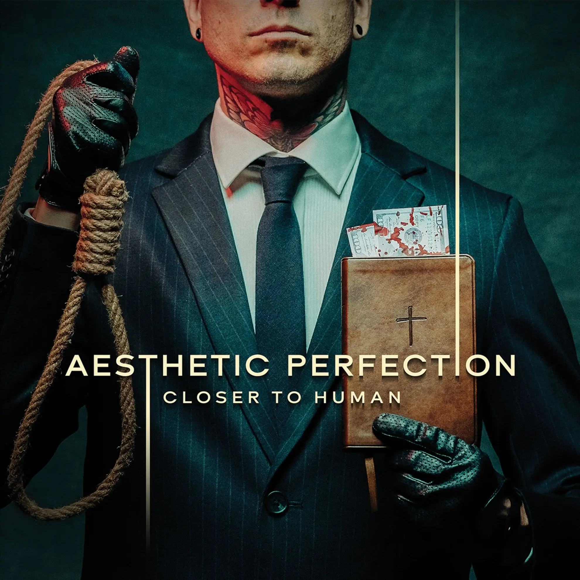 A man in a suit holds a noose in one hand and a blood-splattered Bible with cash in the other; cover of Aesthetic Perfection’s album ‘Closer to Human.’