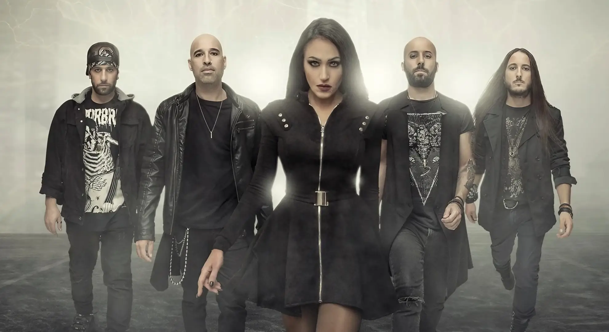 Elysion band members standing together in dark clothing against a foggy, light-filled background.