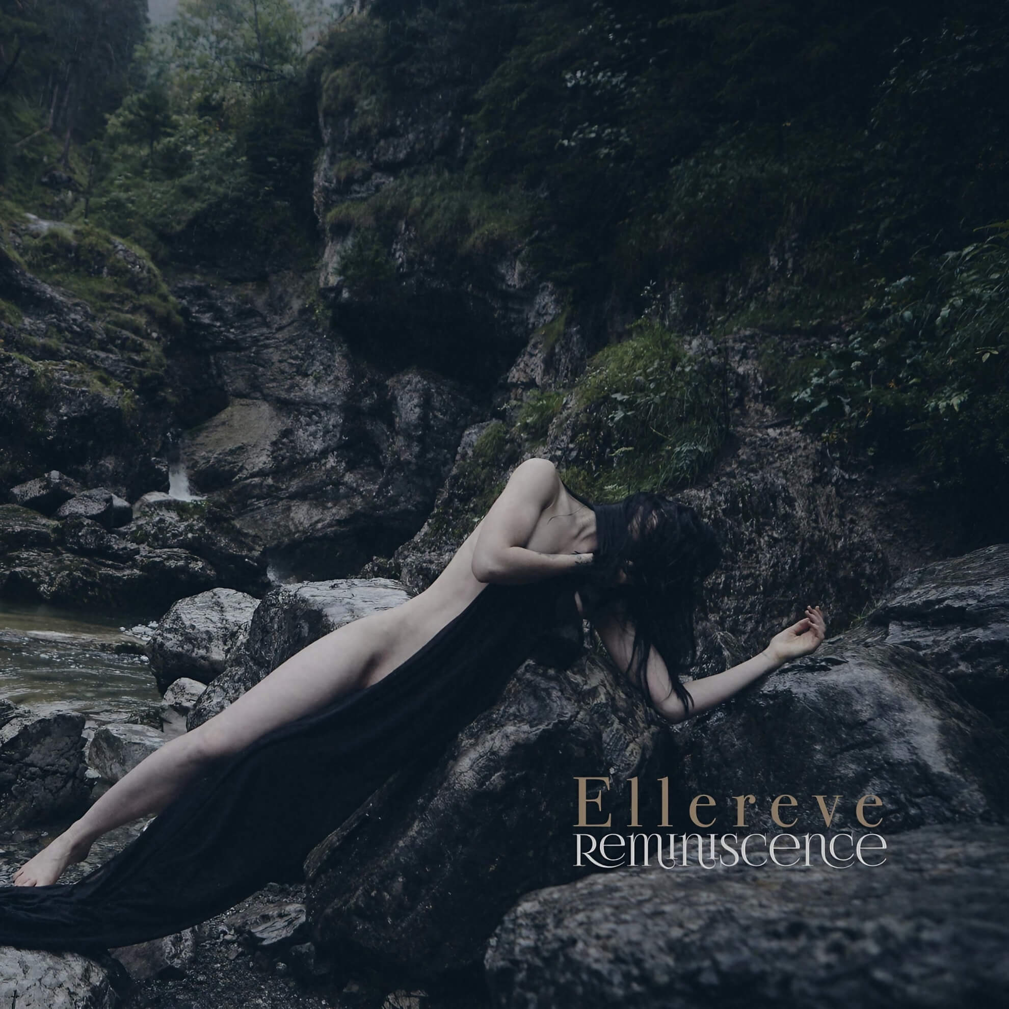 The album cover for Ellereve&rsquo;s &lsquo;Reminiscence,&rsquo; featuring a person lying on rocks by a stream, partially covered by a black cloth.