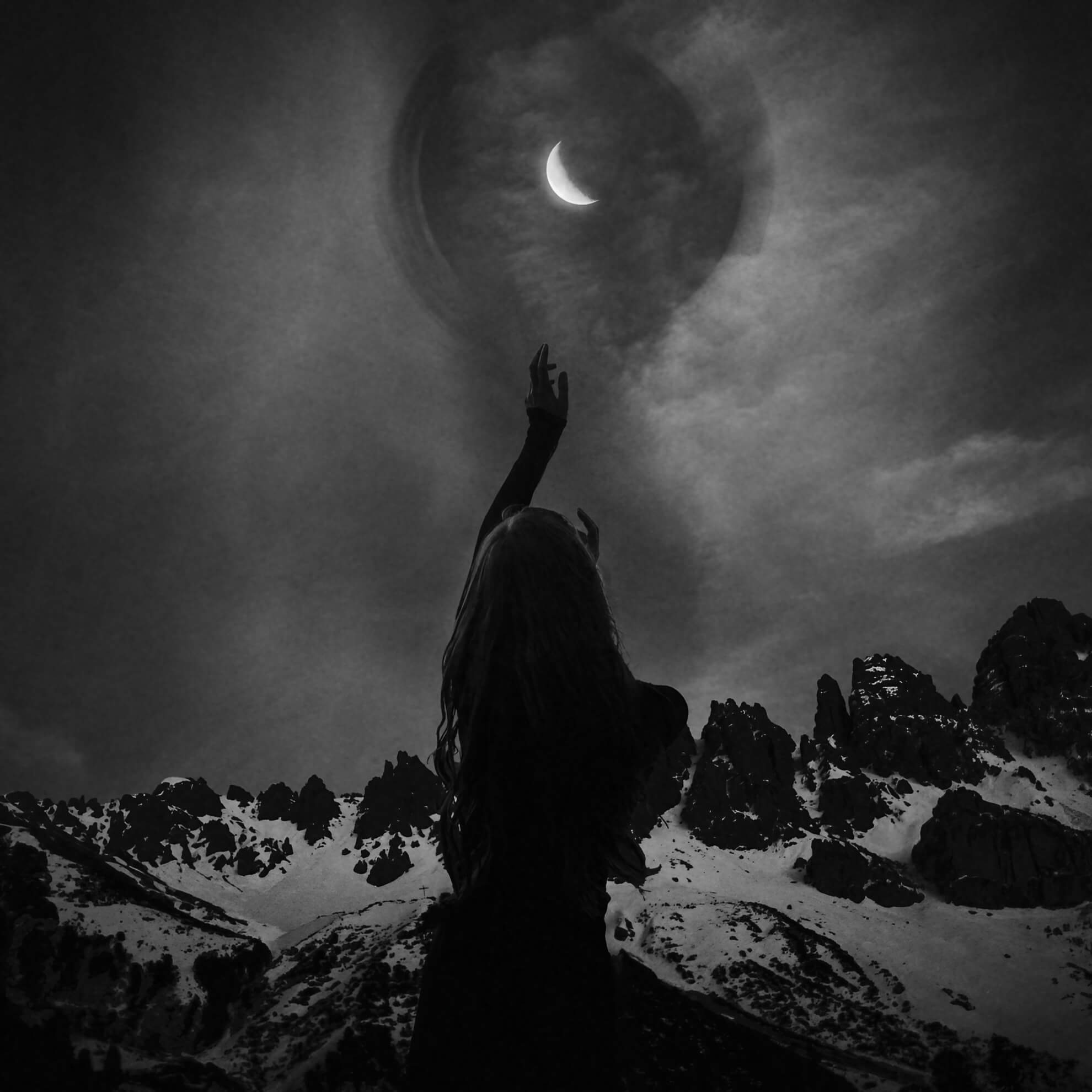 The album cover for Ellereve&rsquo;s &lsquo;Umbra,&rsquo; a black and white image of a figure reaching up towards a crescent moon in a surreal, cloudy sky above snowy mountains.