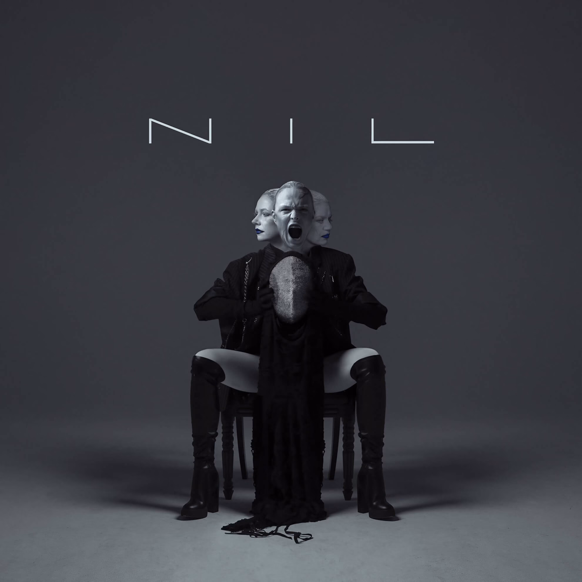 A seated figure with three faces&mdash;two stoic, one screaming&mdash;holds a mesh mask beneath the stylized text &lsquo;NIL.&rsquo;