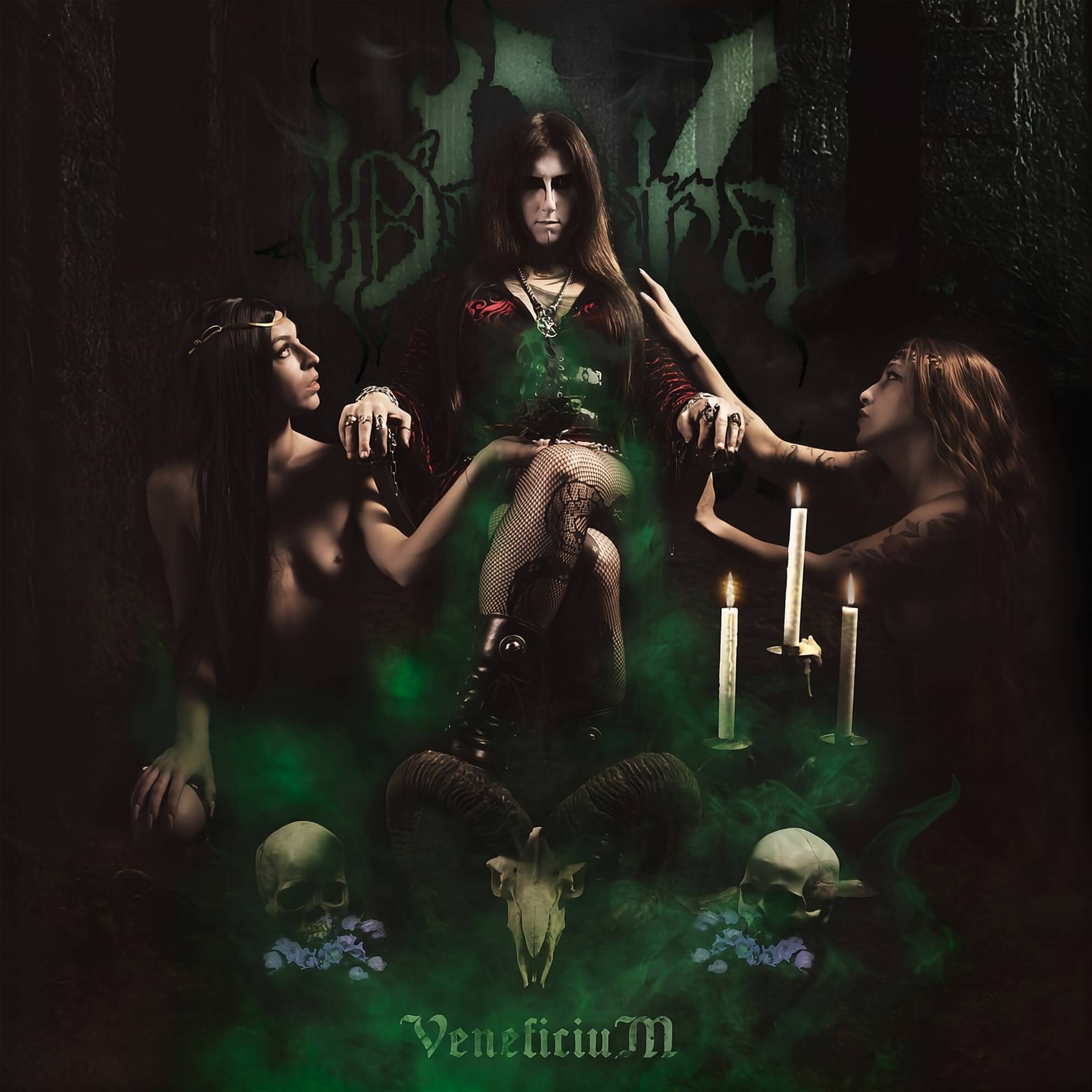 Opera IX and Nocturnal Depression Gather at Bogotá’s Capital Live in November A dark-robed central figure seated on a throne amid green mist, flanked by two kneeling figures, with human skulls, a horned animal skull, candles, and blue flowers arranged at the base. The Opera IX logo appears above; the word VeneficiuM is rendered in green at the bottom.