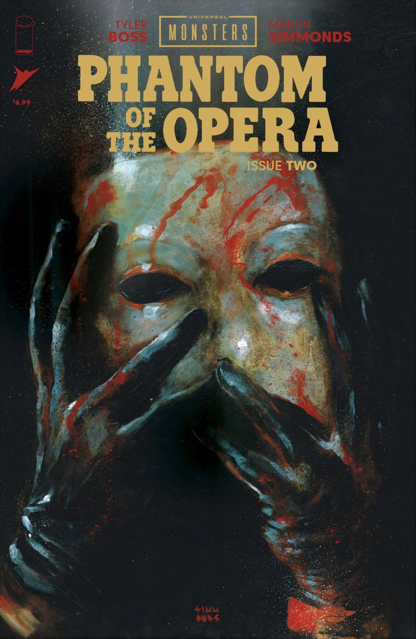 ‘Universal Monsters: The Phantom of the Opera’ Kills First Blood-streaked hands press against the Phantom’s mask on ‘Universal Monsters: The Phantom of the Opera’ #2