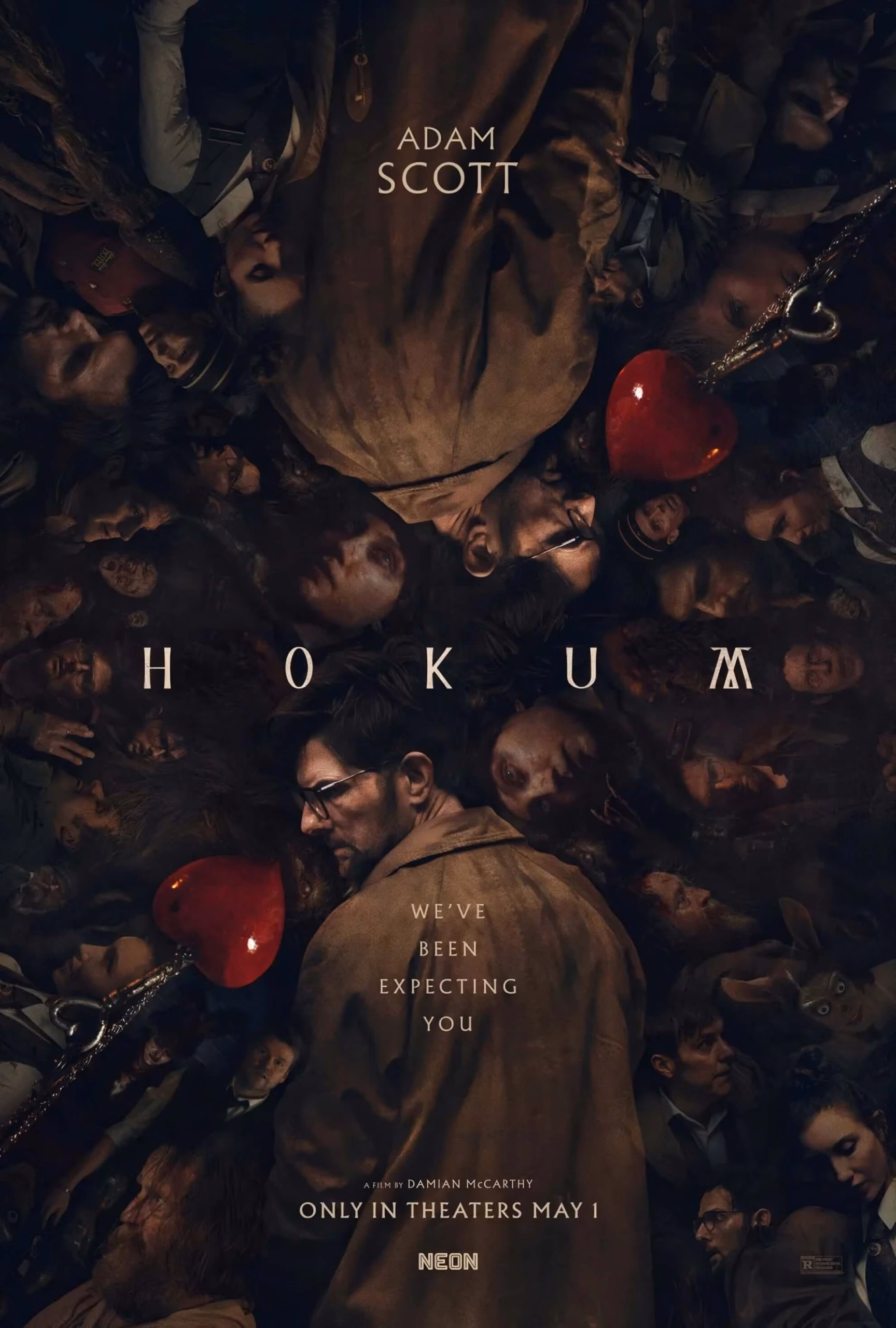 &lsquo;Hokum&rsquo; (2026) one-sheet: Adam Scott as Ohm Bauman seen from above, ringed by distressed faces, title centered.