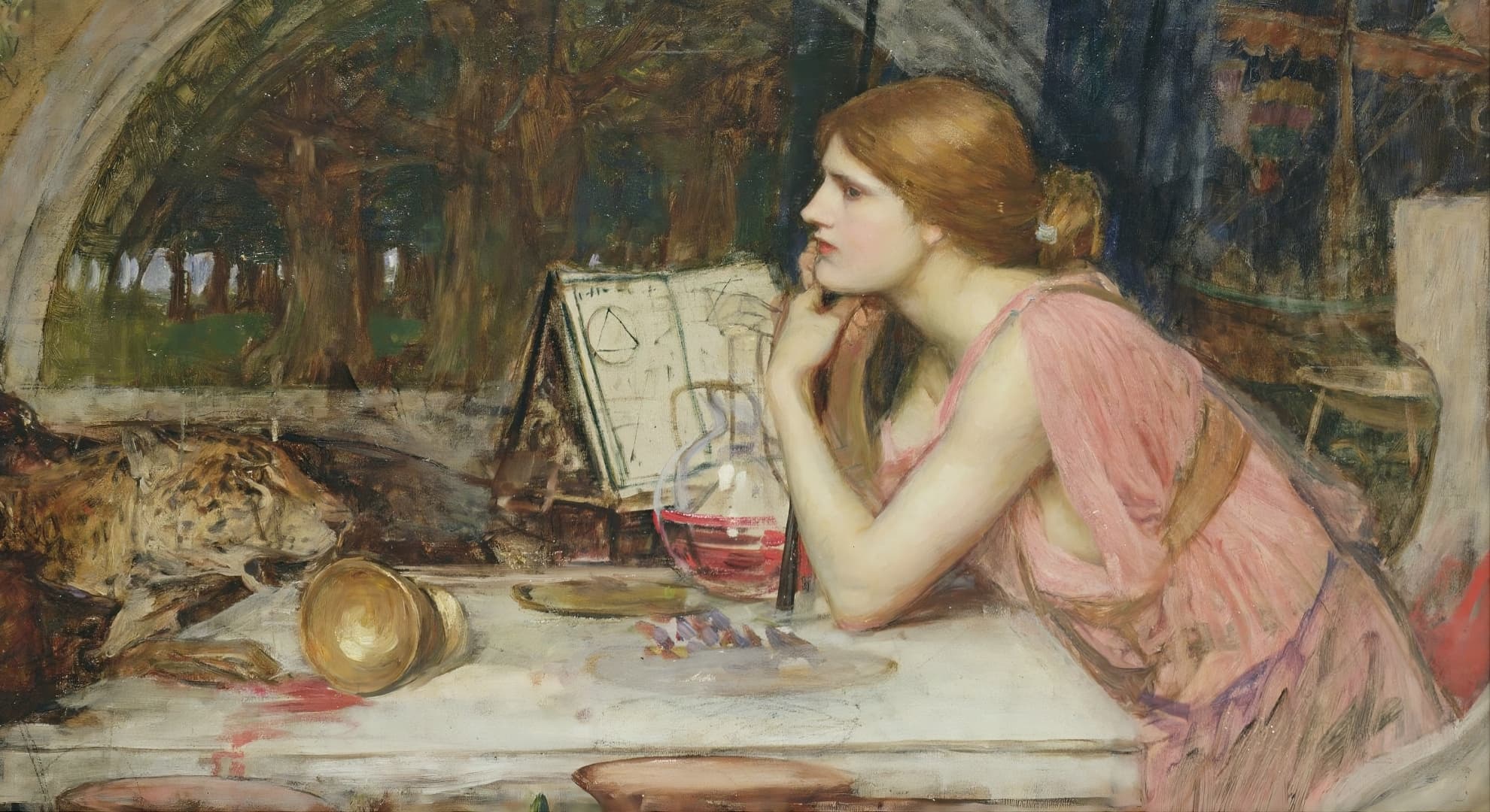 Waterhouse, ‘The Sorceress’ (c. 1911), red-haired figure at a table with open grimoire and alchemical flask, reclining leopard at left.