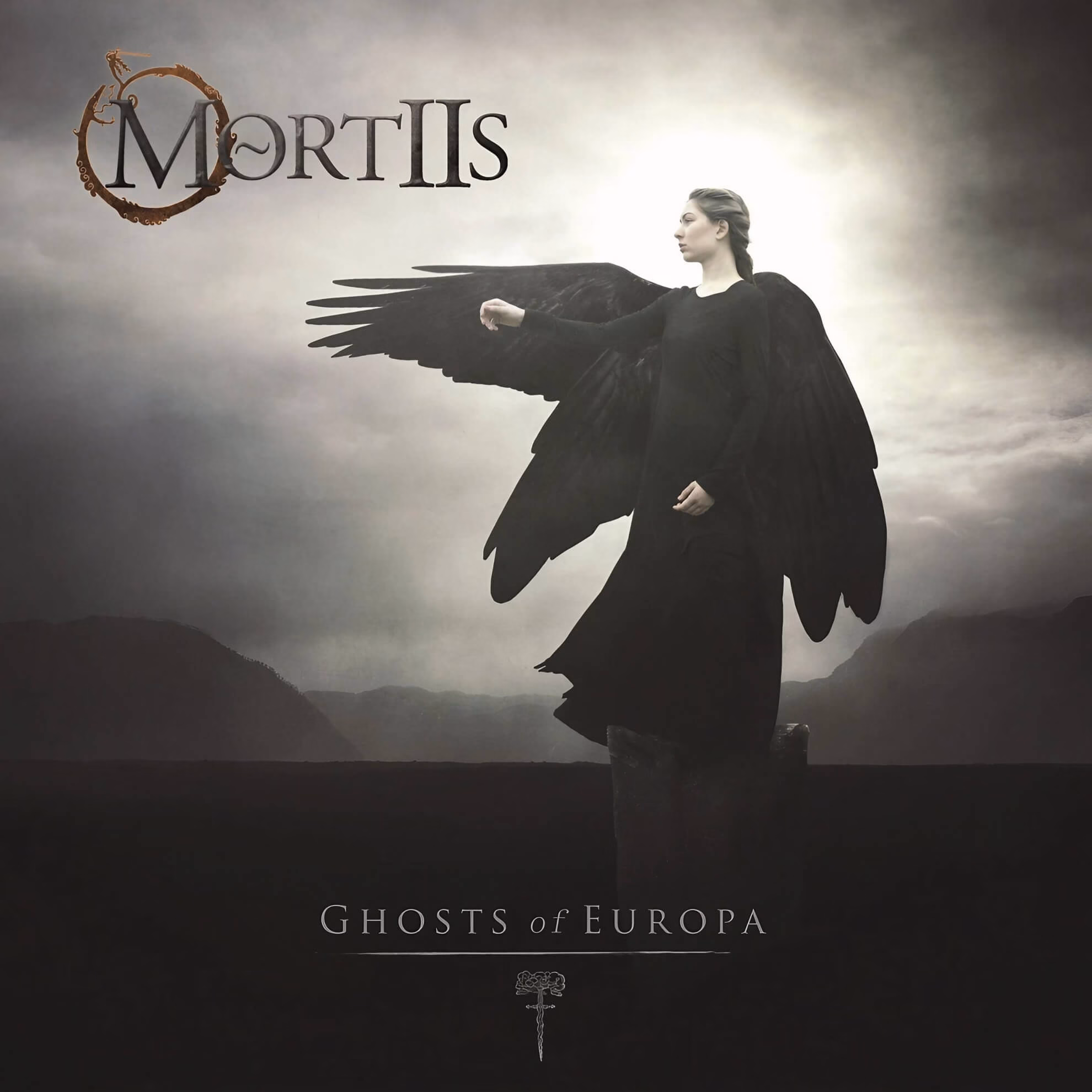 Mortiis &lsquo;Ghosts of Europa&rsquo; album cover &mdash; winged female figure in black against a grey mountainous sky.