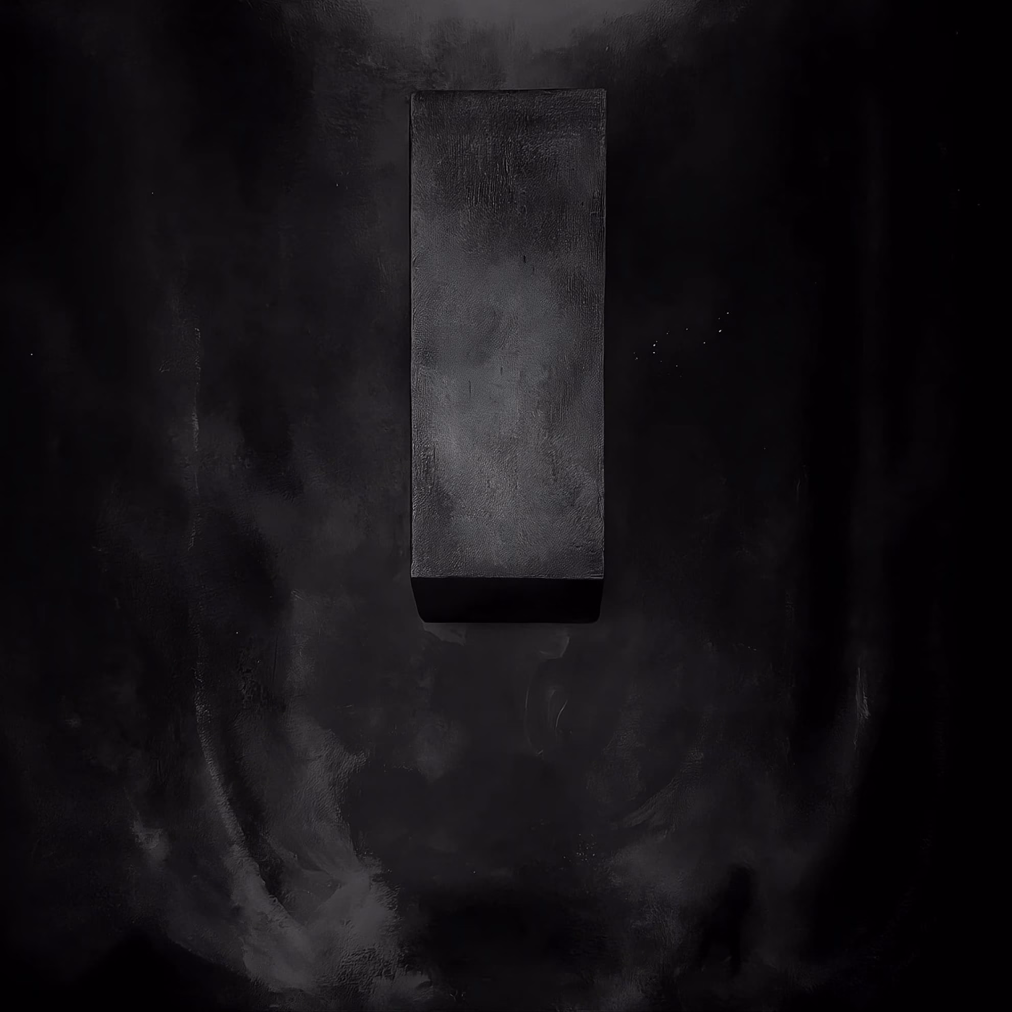 Mork &lsquo;Monolitt&rsquo; album cover &mdash; a dark rectangular stone slab centered against a black smoke-textured background.