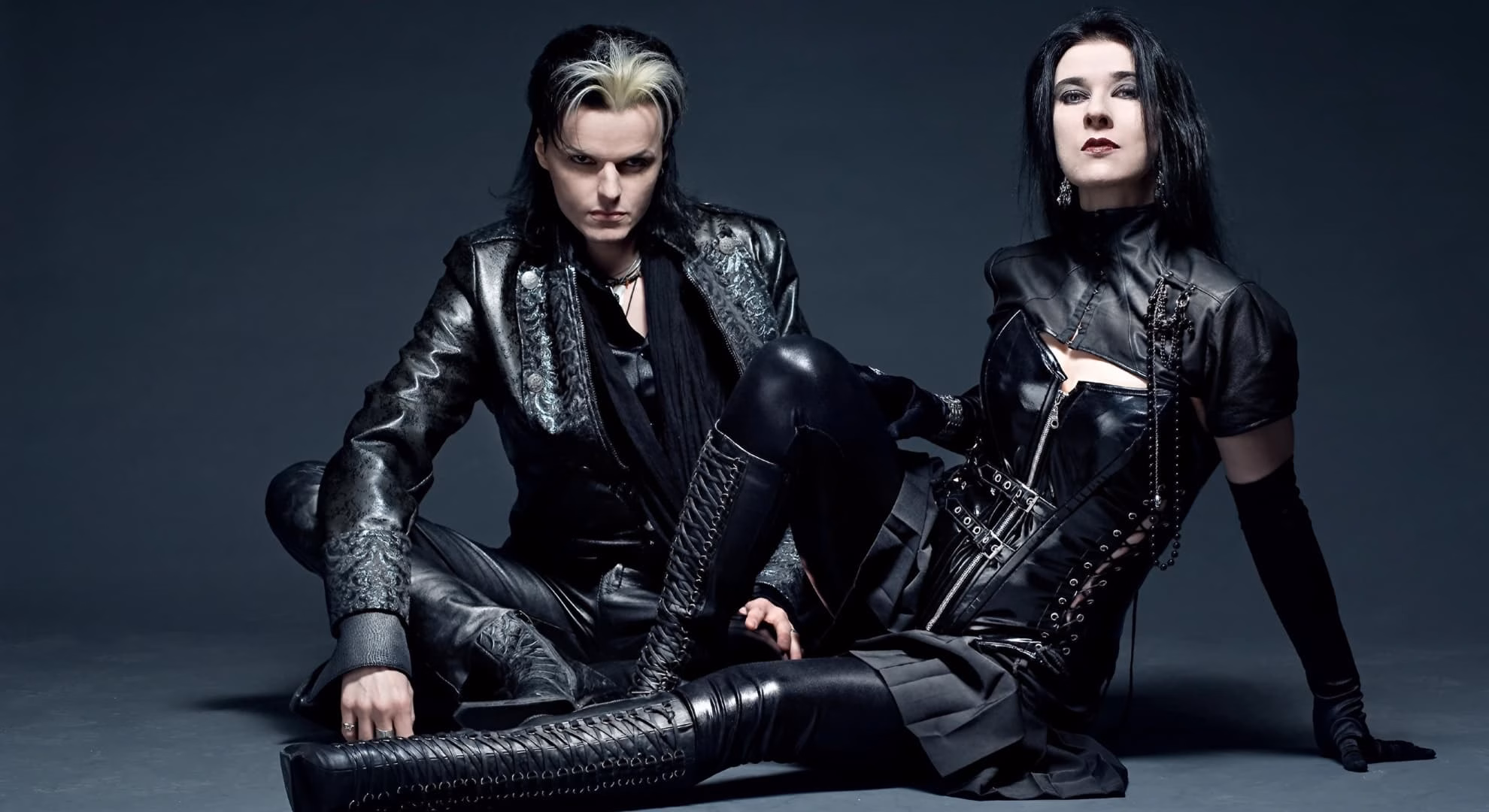 M’era Luna Turns 26 on the Hildesheim Airfield Lacrimosa’s Tilo Wolff and Anne Nurmi pose in black leather for a 2009 press photograph.