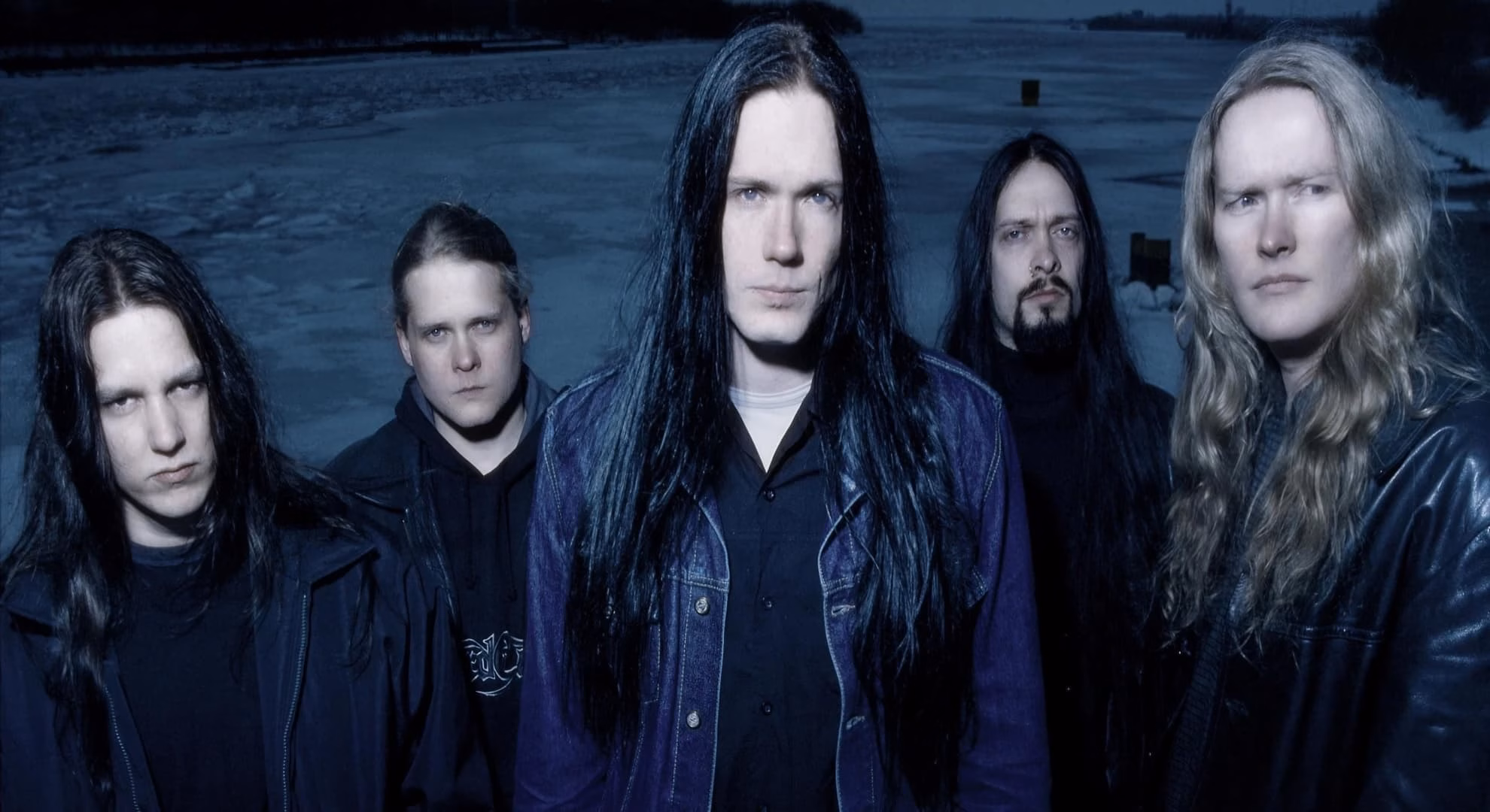 Sentenced and the Finnish Craft of a Chosen Farewell Sentenced’s five members with long hair, standing on a frozen lakeshore under a gray winter sky.
