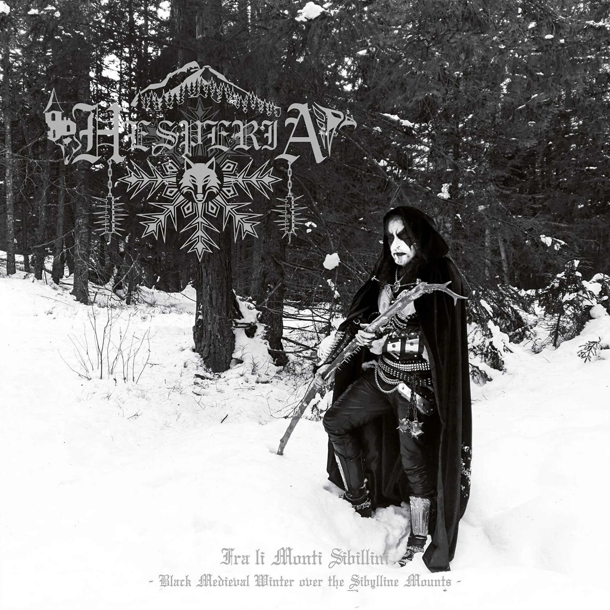 Hesperia, ‘Fra Li Monti Sibillini’ cover: black-and-white forest photo, gray wolf-mountain logo, hooded figure with a branch.