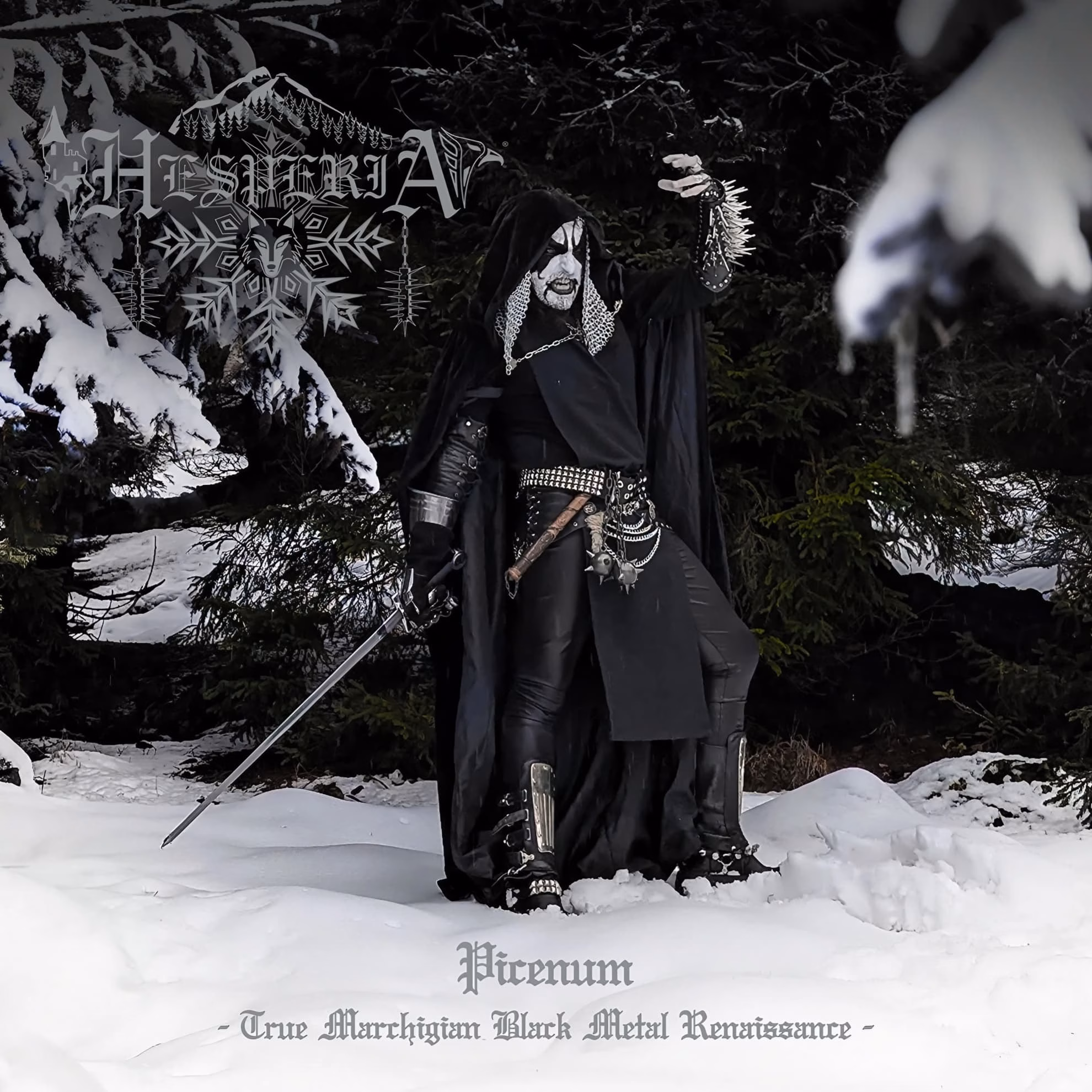 Hesperia, ‘Picenum’ cover: hooded figure raising a spiked gauntlet, sword drawn, dark snowy forest, gray wolf-mountain logo.