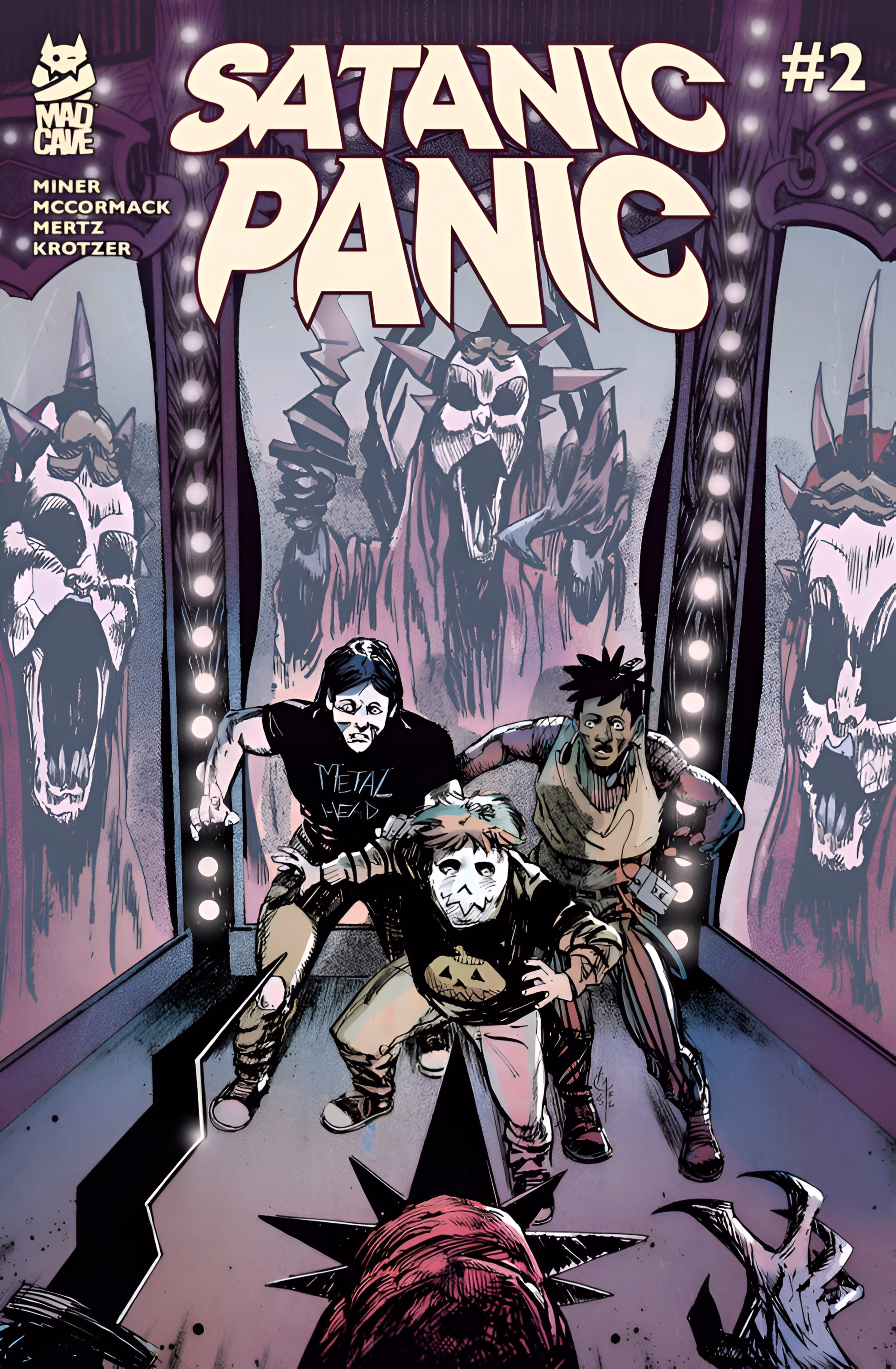 Matt Miner Puts a Whole Town on Trial in ‘Satanic Panic’ Comic book cover for ‘Satanic Panic’ #2. Three teenagers hurry down a mirror-lined hall of lights as snarling masked figures loom in the glass.