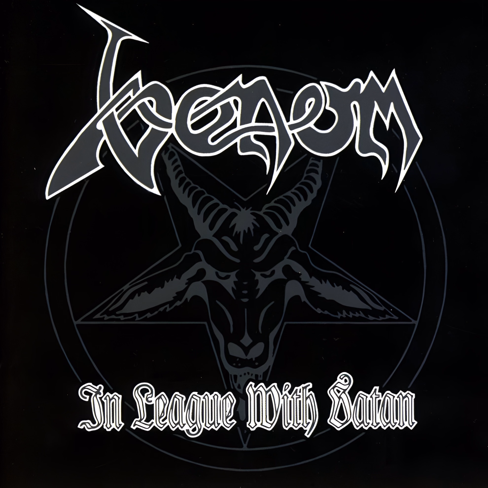 Conrad “Cronos” Lant Sang as the Devil, Not About Him Single cover of ‘In League with Satan’ by Venom. The jagged gray band logo hangs over a goat head inside a pentagram, with the title in gothic script.